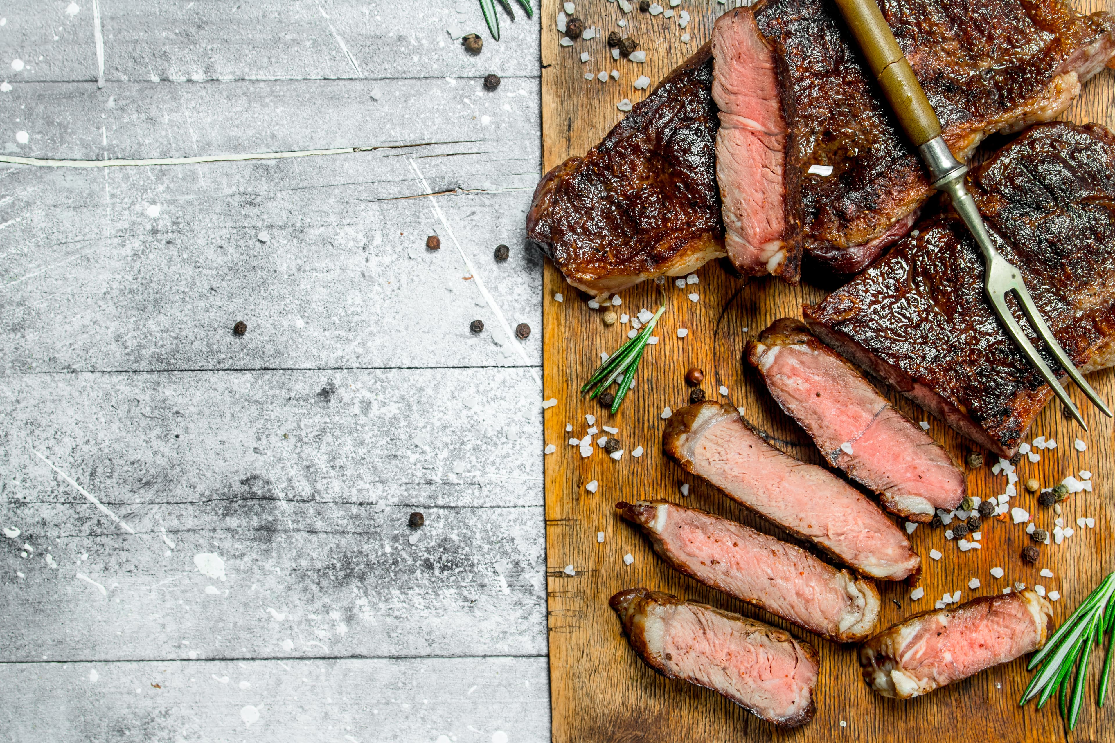 Premium grilled beef steak with rosemary and spices